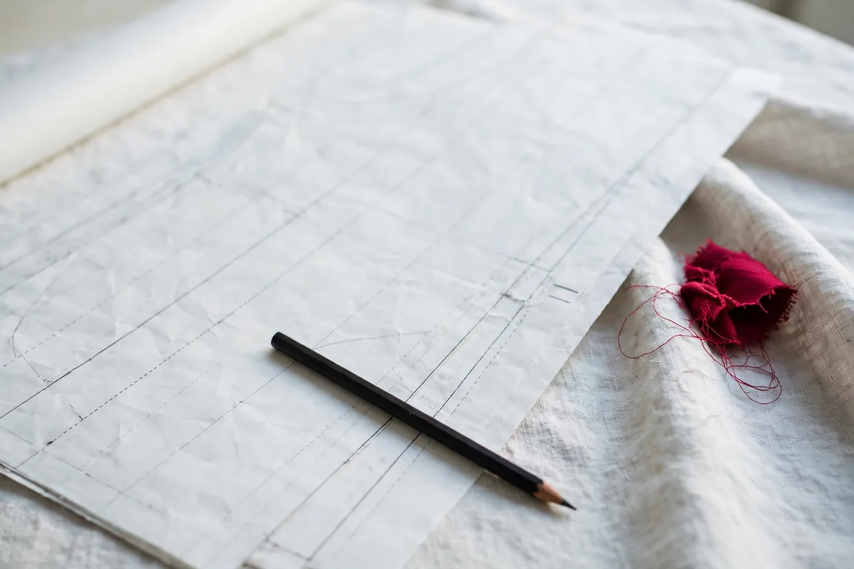 Pattern paper and a pencil on a table